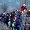 कोसोवो के शरणार्थी, 1999 में मैसीडोनिया के उत्तरी इलाक़े ब्लेस में पहुँचते हुए. (फ़ाइल फ़ोटो)