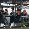 联合国驻泰国协调员萨巴瓦尔（Gita Sabharwal，后排中）参加湄公河沿岸的联合巡逻。