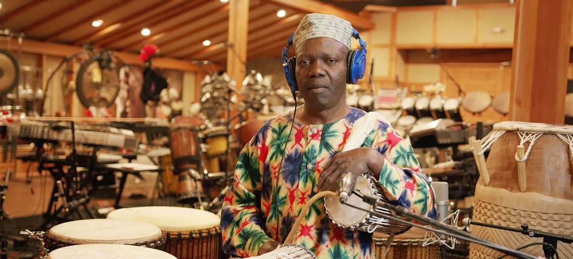Nigerian percussionist Sikiru Adepoju performing 