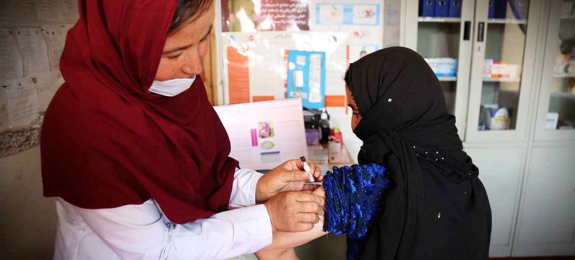 A midwife at a family health house in Daikundi, Afghanistan, provides care (file photo). .