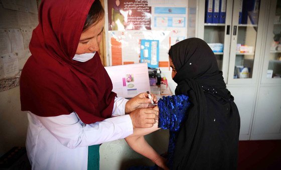 A midwife at a family health house in Daikundi, Afghanistan, provides care (file photo). .