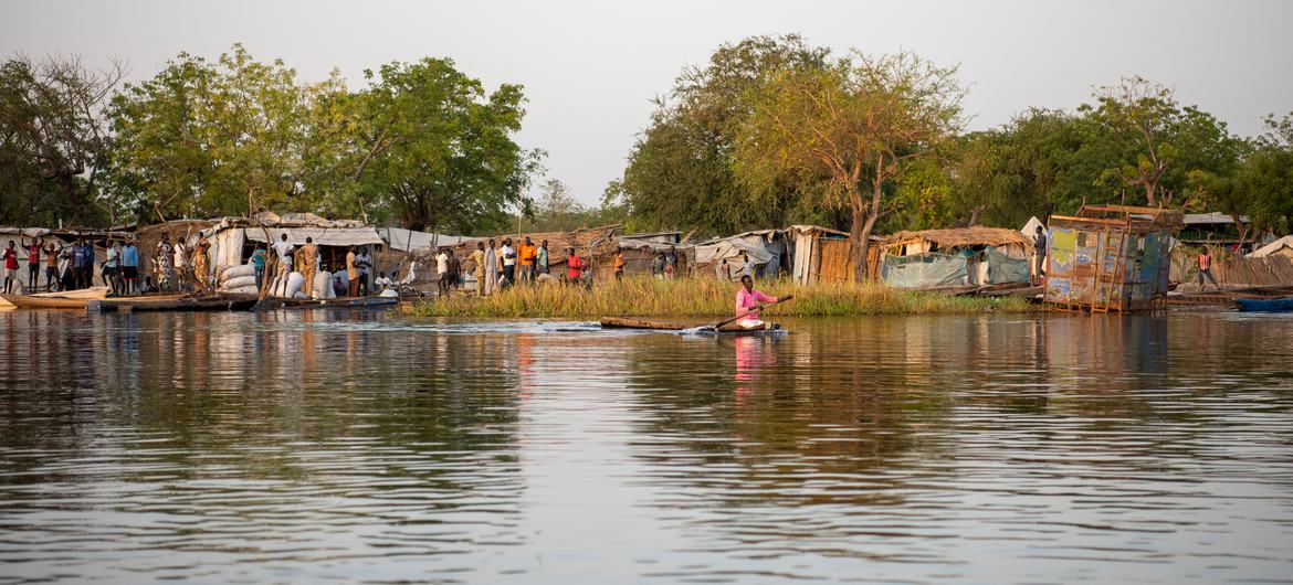 Canoes have become the only means of transport for residents of Old Fangak, South Sudan.