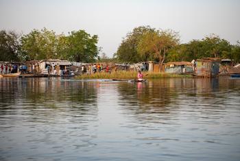 Canoes have become the only means of transport for residents of Old Fangak, South Sudan.