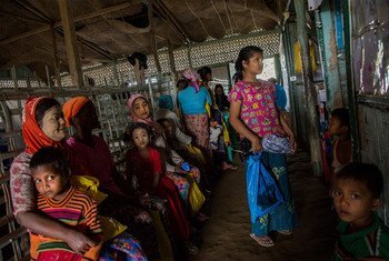 Women and children from a local community at a health centre in Sittwe, in Myanmar's northern Rakhine state. (file photo)