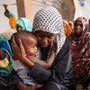 Dans la ville désertique isolée d'Agadez, au Niger, les demandeurs d'asile et les migrants vivent aux côtés d'hôtes nigériens.