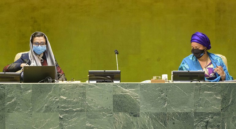 Adela Raz (left), Vice-President of the 75th session of the General Assembly and Permanent Representative of the Islamic Republic of Afghanistan to the United Nations, chairs the general debate of the General Assembly's 75th session. At right is Deputy Se