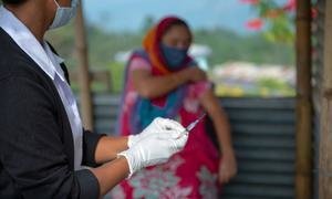 COVID vaccines are being administered at a village clinic in Kohima, India.
