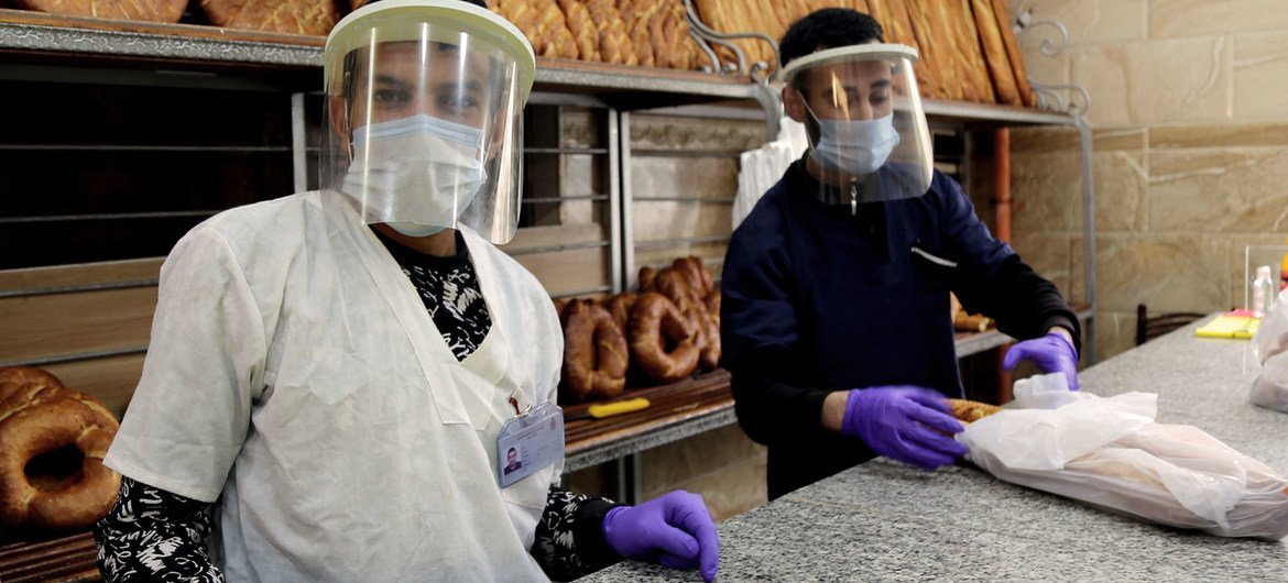 Vendors in a bakery in Constantine, Algeria, during the COVID-19 crisis.