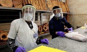 Vendors in a bakery in Constantine, Algeria, during the COVID-19 crisis.