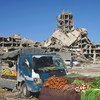 Vegetables are sold amidst the rubble of the old town of Benghazi in Libya.