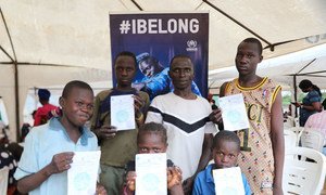 Children at a camp for displaced people in Nigeria receive birth certificates, an important document to proved their nationality.  