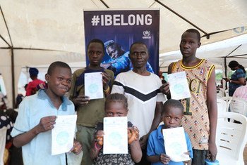 Children at a camp for displaced people in Nigeria receive birth certificates, an important document to proved their nationality.  