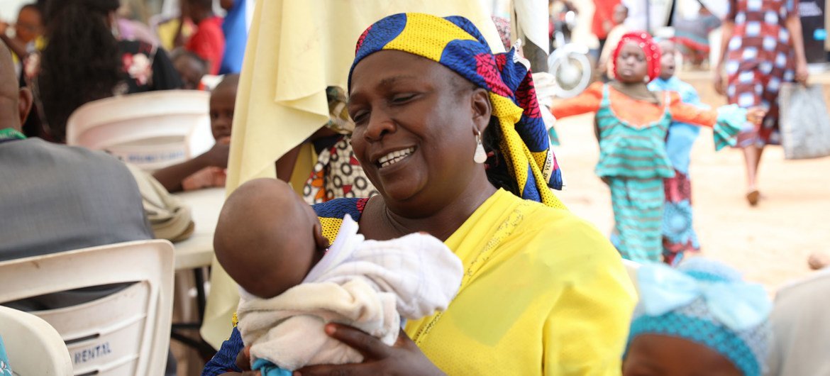 A displaced Nigerian woman is happy that the children she delivered will get birth certificates .