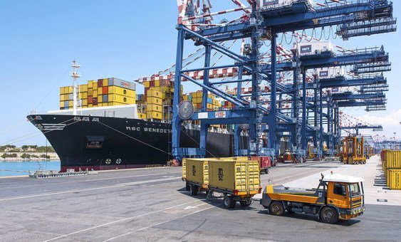 A container ship unloads at the port of Gioia Tauro in Italy.