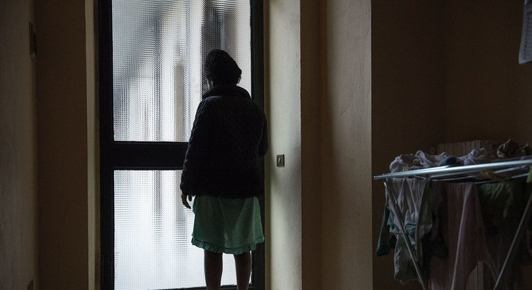 A Nigerian girl, pregnant with twins after being forced into prostitution following her arrival in Italy via the Mediterranean Sea route from Libya, stands in a home run by an Italian NGO where she is being sheltered in Asti, Piedmont region, Italy. (2017)