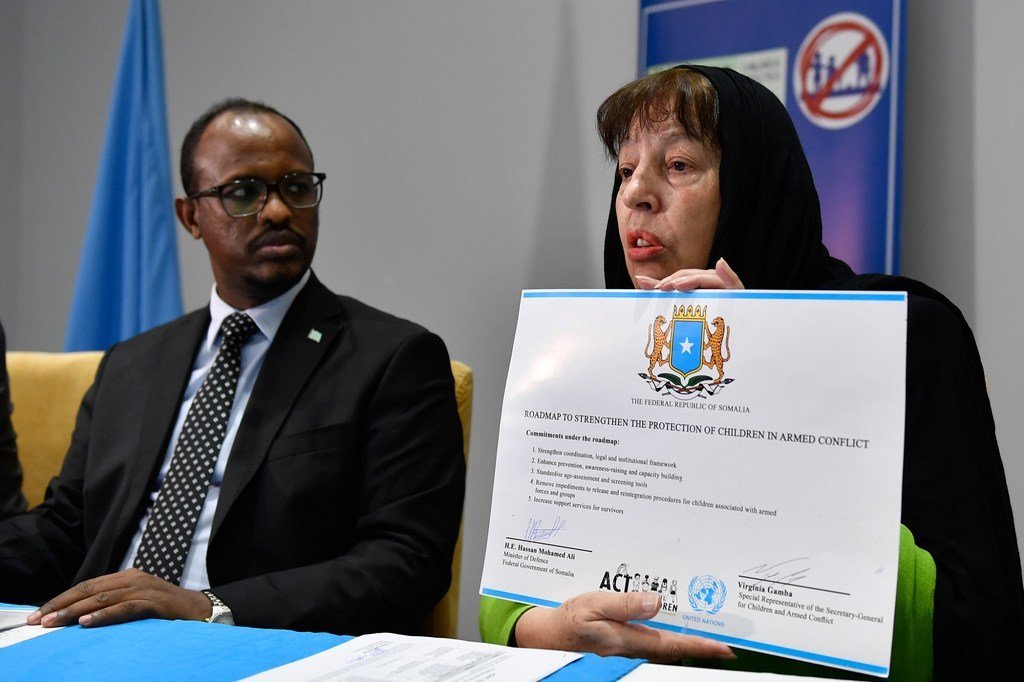 Virginia Gamba, the Special Representative of the Secretary-General for Children and Armed Conflict, displays the signed roadmap to strengthen the protection of children in armed conflict during a meeting with Somali Federal Government Ministries and commissioner of police in Mogadishu, Somalia on 28 October 2019. 