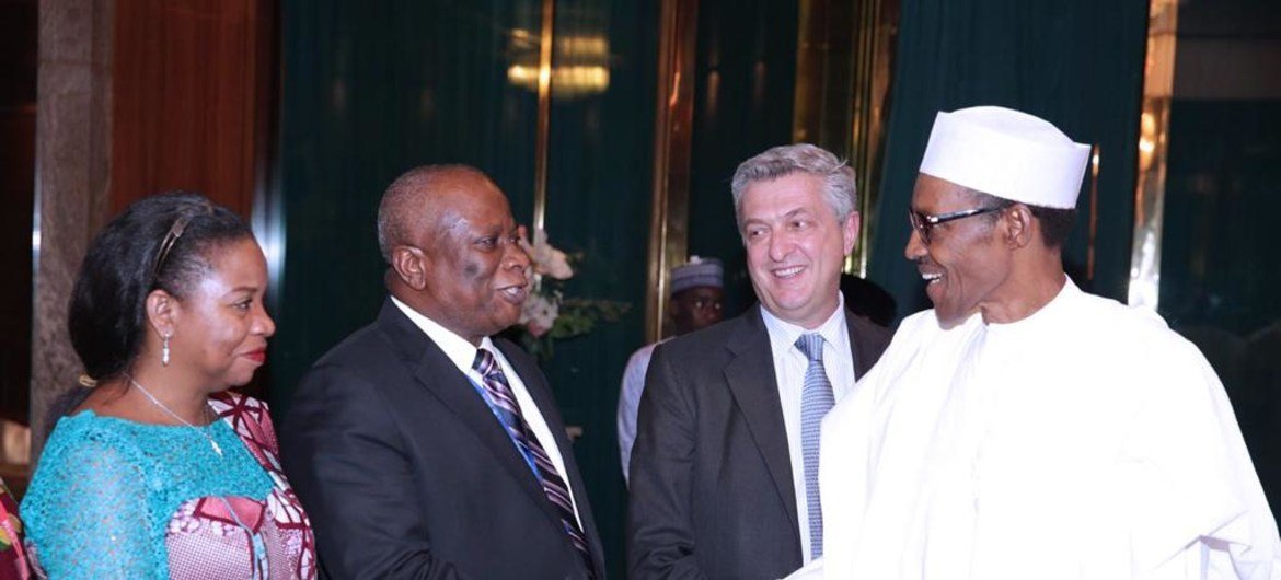 Edward Kallons, UN Resident Coordinator successful  Nigeria (l) and Nigerian President Muhammadu Buhari (r)