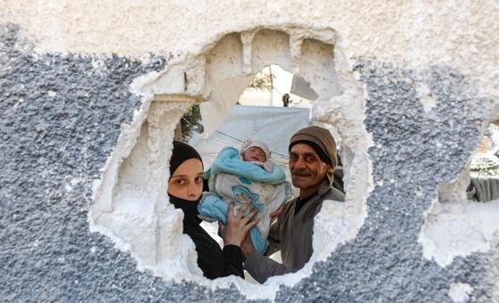 A one-month-old baby shelters with her family in Adra after fleeing eastern Ghouta in Syria.