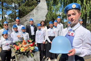 Daria Yelisieienko from Kharkiv, Ukraine, attends the ceremony to mark the International Day of UN Peacekeepers at The UN Geneva.