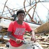 Fifteen-year-old Benson Etienne and his family escaped before their house collapsed in hurricane-hit Marsh Harbour, Abaco Island, Bahamas. (September 2019)