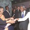 Kofi Annan receiving congratulations from UN Staff