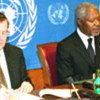 Kofi Annan and spokesman Fred Eckhard at news conference
