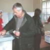 Pristina voter casts his ballot