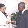 Annan presents his check to UN staff fund for terror victims