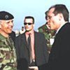 Michael Steiner (right) greeted at Pristina Airport