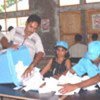 UN staff counting ballots from Sunday's presidential election