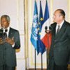 Kofi Annan and French President Jacques Chirac at press briefing