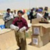 Distributing relief aid in Iraqi Kurd villages