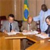 Signing agreement witnessed by FAO Director-General