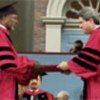 Annan (L) presented an honorary diploma at Harvard University