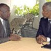 Kofi Annan (R) with Ivoirian President Laurent Gbagbo