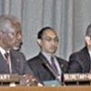 Kofi Annan (left) addresses meeting of ministers
