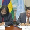 Amb. Koonjul and USG Chowdhury sign agreement