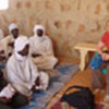 Chamberlin and Sudanese refugee leaders in Touloum camp