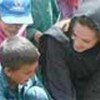 Jolie with Afghan children