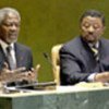 Annan addresses meeting. GA President Jean Ping (right)