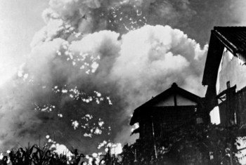 Atomic cloud bursting over Hiroshima, 2 minutes after the explosion, at 8:17 am on 6 August 1945.