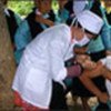 Hmong woman receives vaccine, Viet Nam