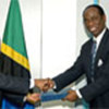 Amb. Simon U.R. Mlay and IFAD's Cyril Enweze