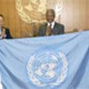Flag presented to Annan by astronaut (file photo)