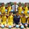 Footballs donated to children  by UNAMA staff