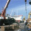 Goods being loaded and unloaded at port