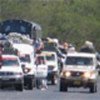 Convoy taking displaced back to their homes (May 2006)