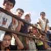 Children evacuated by truck near Sidon, south Lebanon