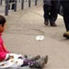 Child begging on a street