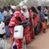 Somali refugees receiving supplies from UNHCR